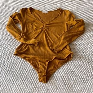Altar'd State Mustard Ribbed Long-Sleeve Bodysuit